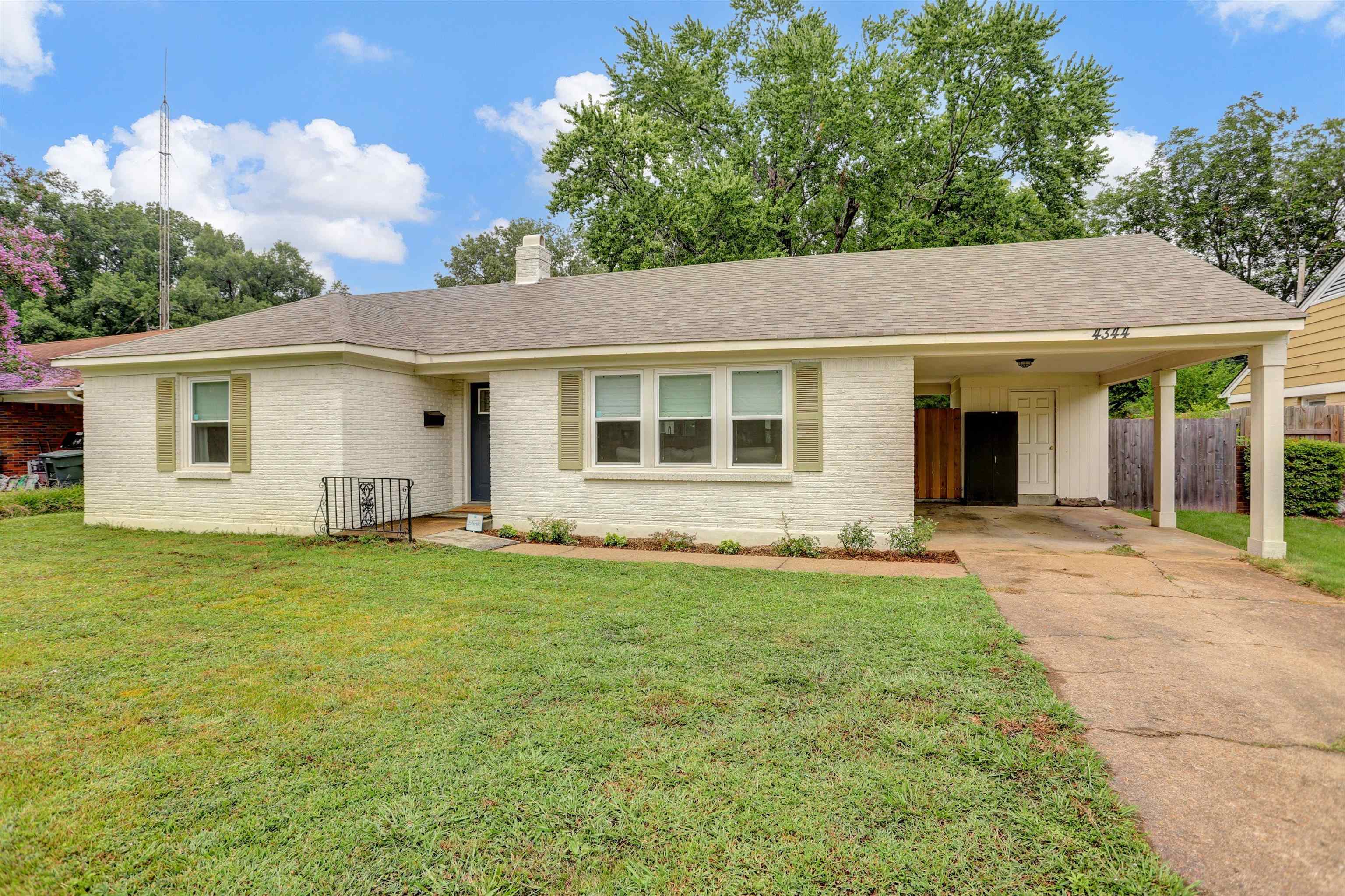 4344 Rhodes Avenue Memphis, TN 38111 - Photo 4 of 31 a view of a backyard with a garden