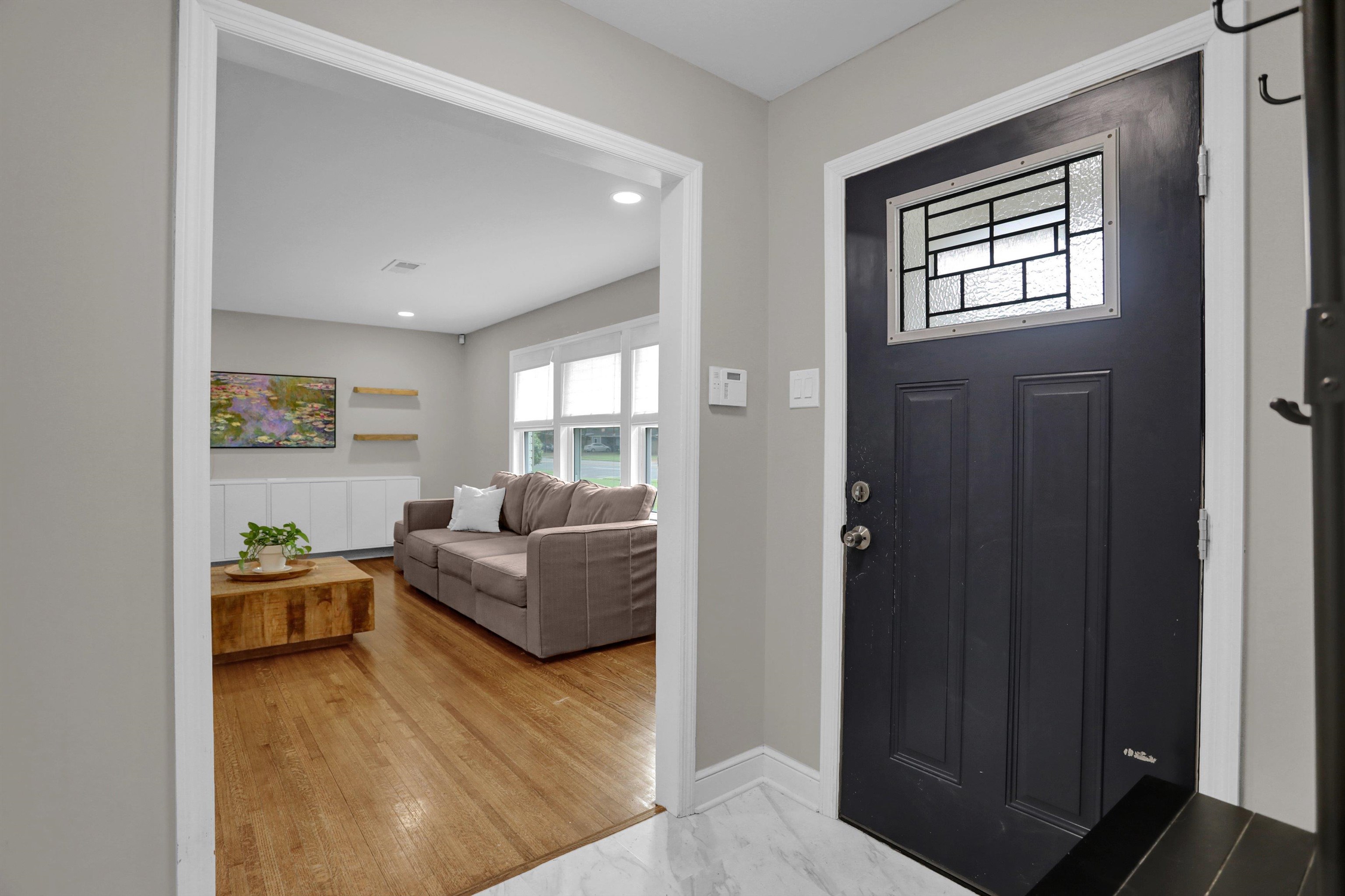 4344 Rhodes Avenue Memphis, TN 38111 - Photo 5 of 31 a living room with furniture and a window
