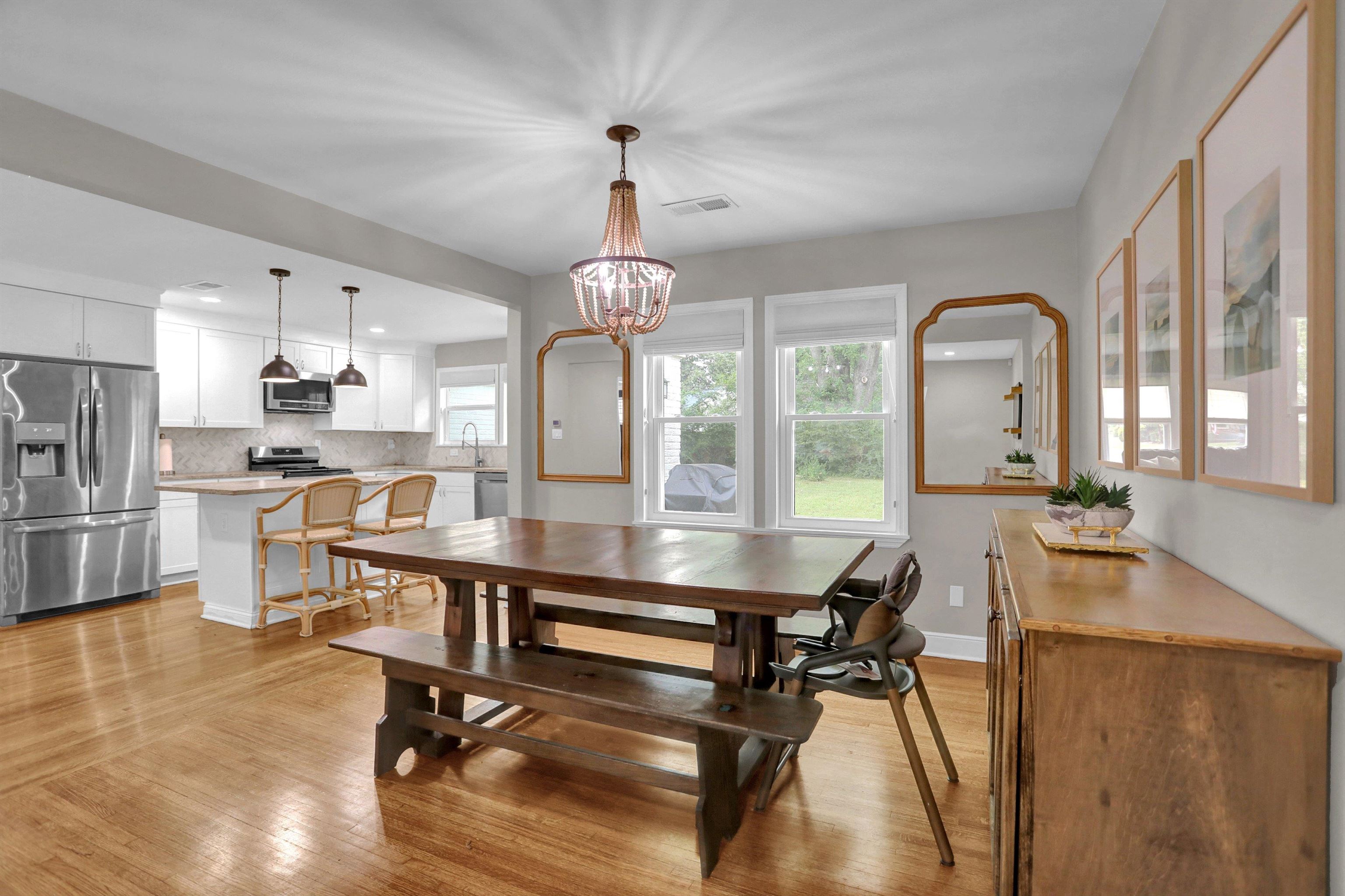 4344 Rhodes Avenue Memphis, TN 38111 - Photo 10 of 31 a view of a dining room with furniture window and wooden floor