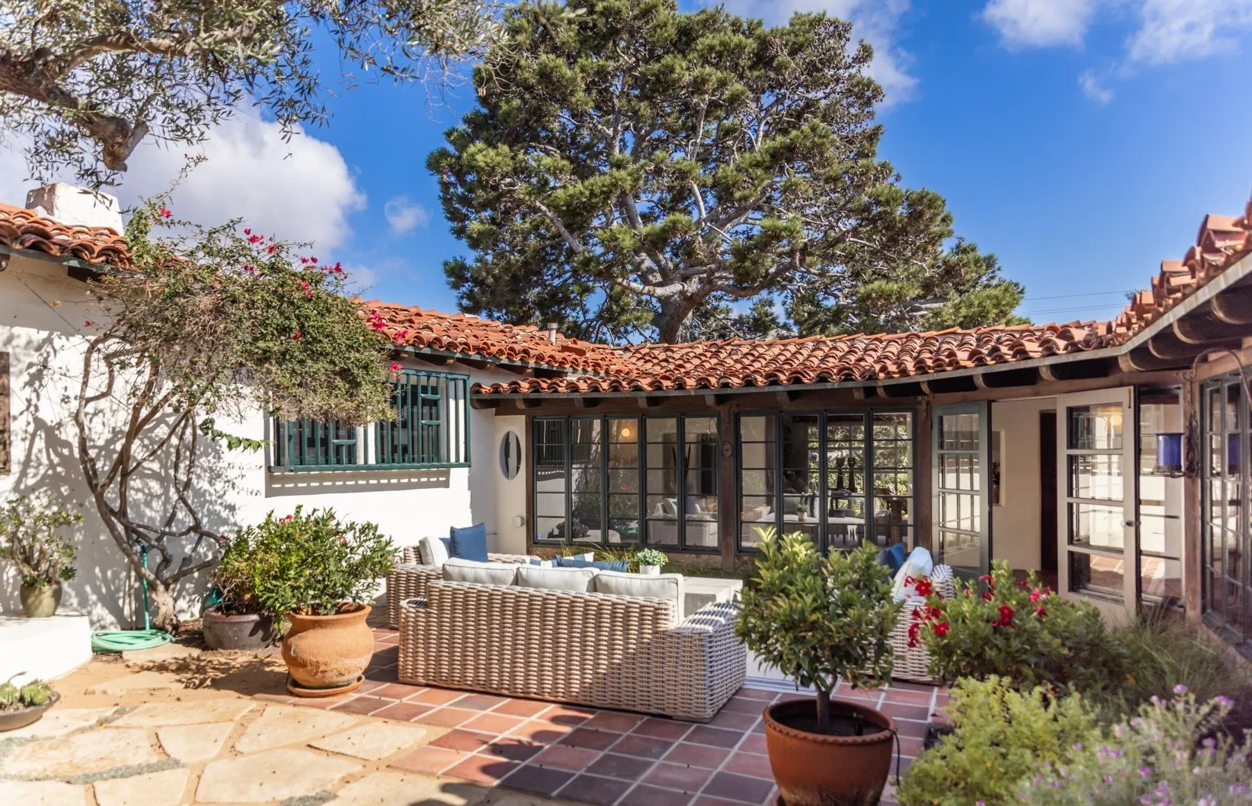 6004 Avenida Cresta La Jolla, CA 92037 - Photo 18 of 58 a front view of a house having yard