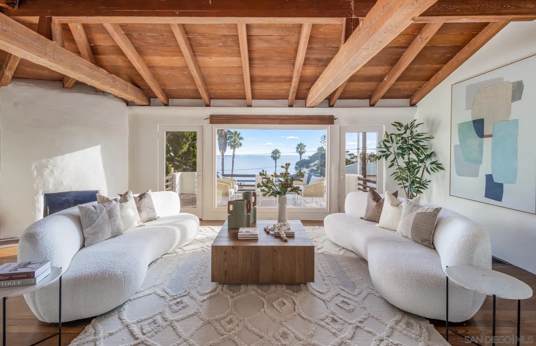 6004 Avenida Cresta La Jolla, CA 92037 - Photo 24 of 58 a living room with furniture and a large window