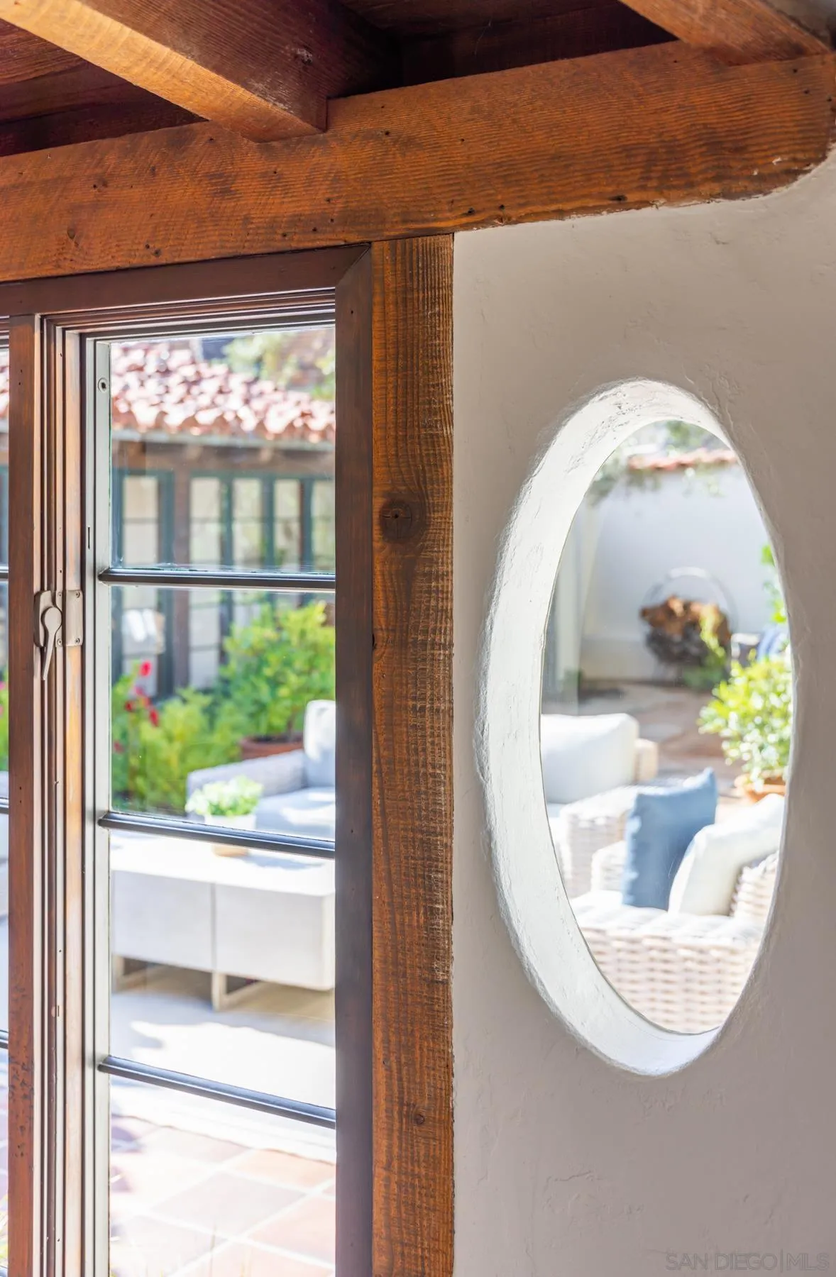 6004 Avenida Cresta La Jolla, CA 92037 - Photo 29 of 58 a view of a wooden door with a swimming pool