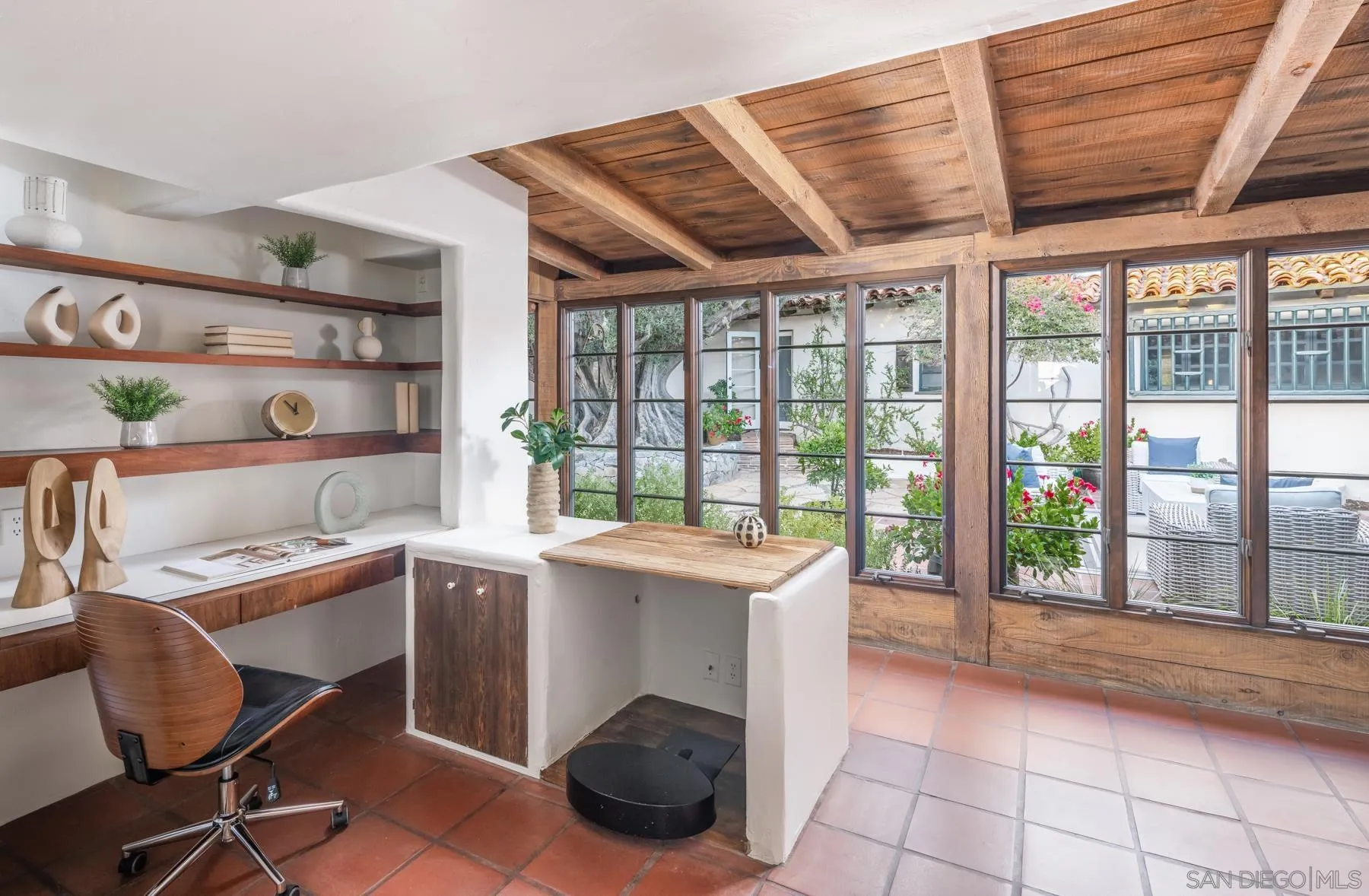 6004 Avenida Cresta La Jolla, CA 92037 - Photo 30 of 58 a kitchen with a sink and a large window
