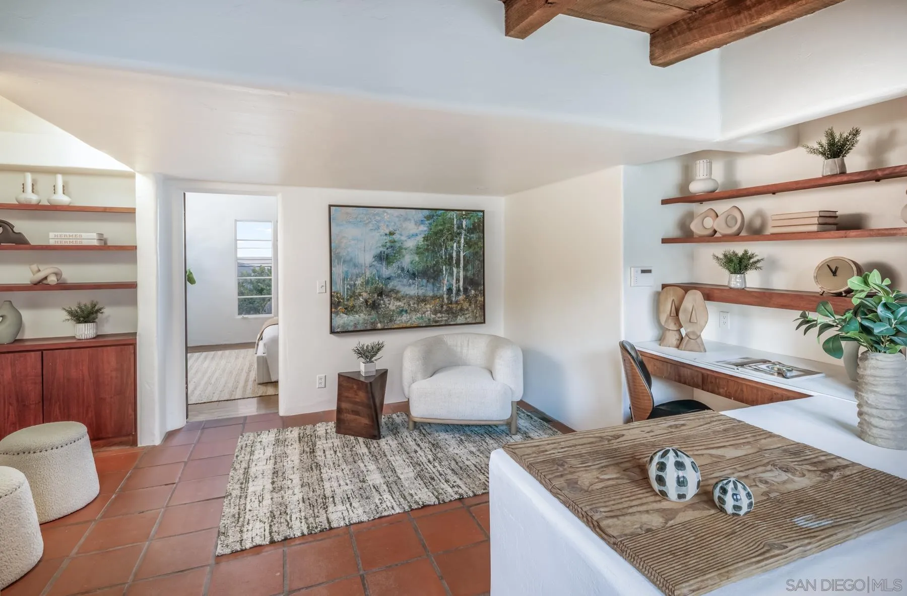 6004 Avenida Cresta La Jolla, CA 92037 - Photo 31 of 58 a living room with furniture and a potted plant