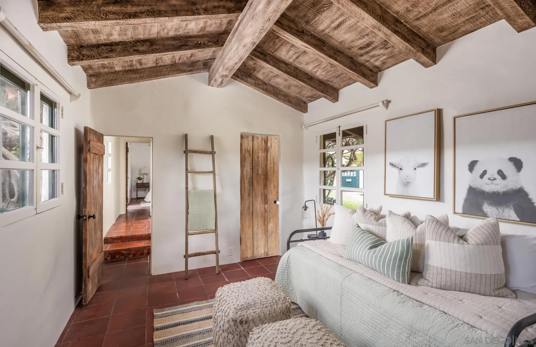 6004 Avenida Cresta La Jolla, CA 92037 - Photo 44 of 58 a living room with furniture and a couch