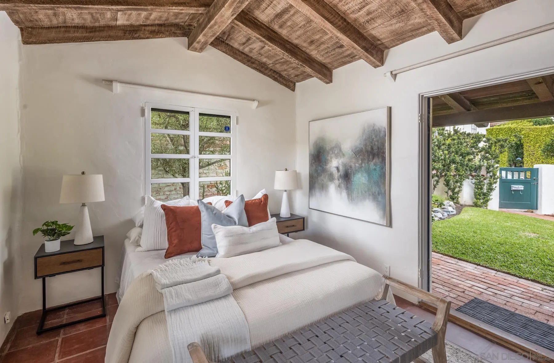 6004 Avenida Cresta La Jolla, CA 92037 - Photo 45 of 58 a bedroom with a bed and a window