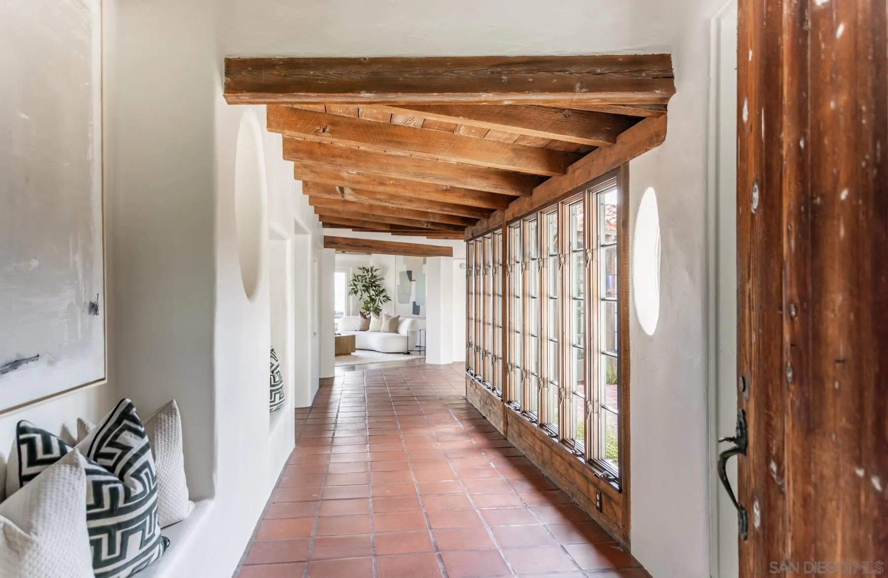 6004 Avenida Cresta La Jolla, CA 92037 - Photo 6 of 58 a view of a hallway with wooden floor and staircase