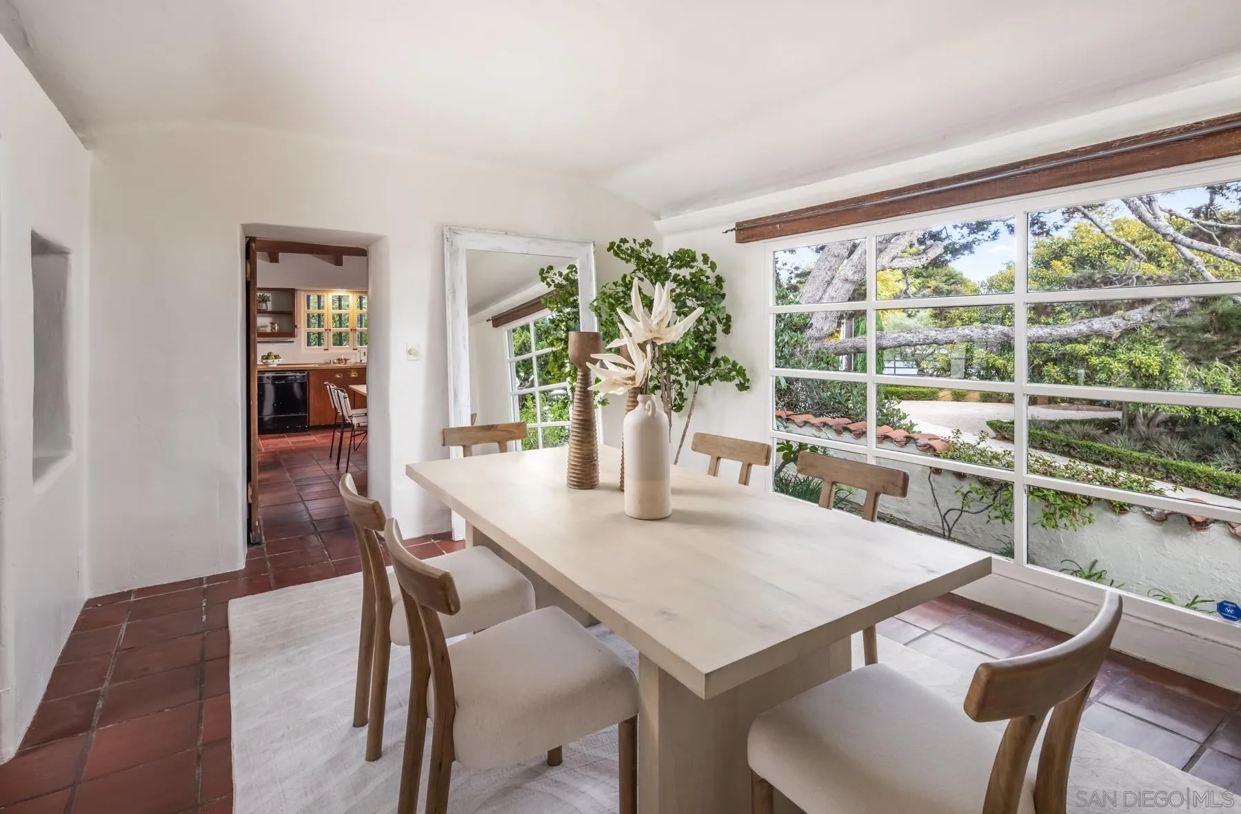 6004 Avenida Cresta La Jolla, CA 92037 - Photo 8 of 58 a view of a dining room with furniture and a potted plant