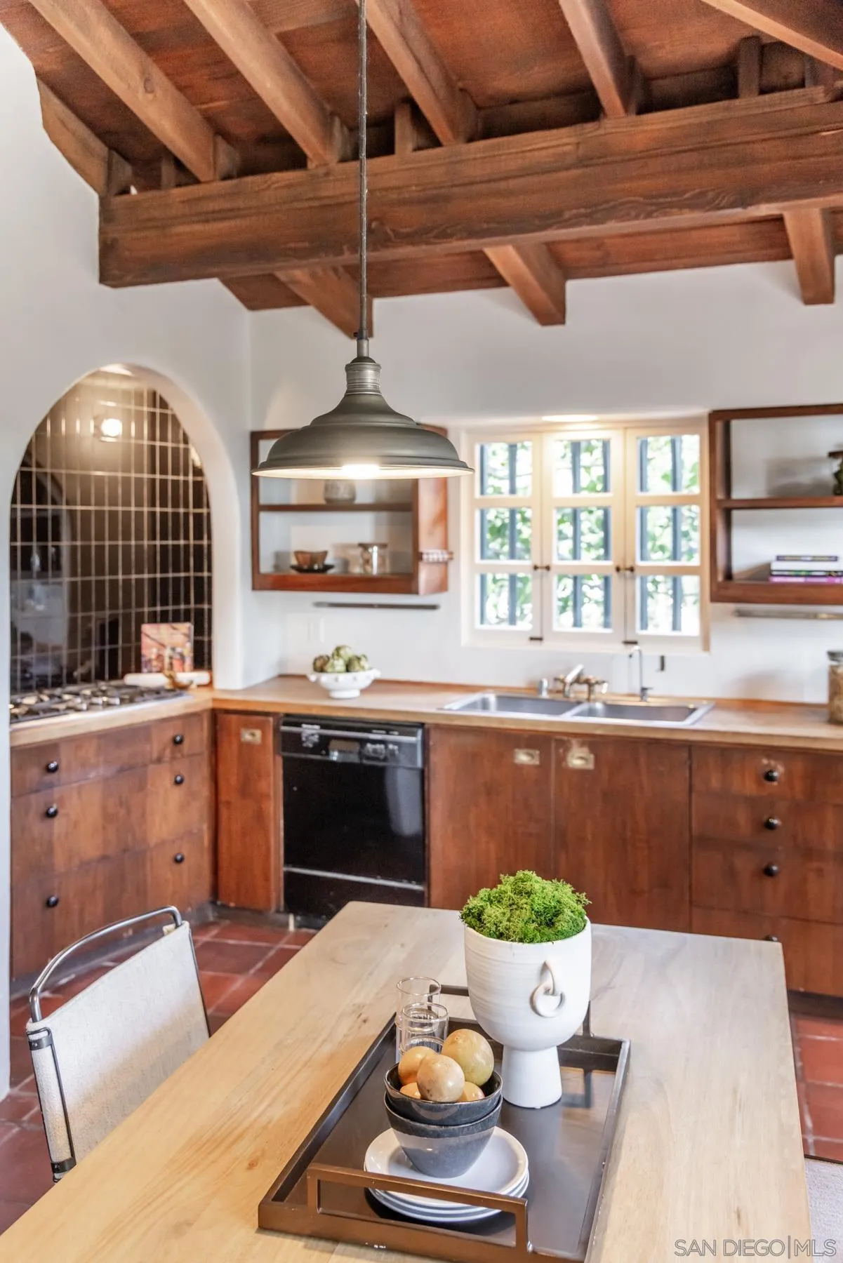 6004 Avenida Cresta La Jolla, CA 92037 - Photo 9 of 58 a kitchen with a table and chairs