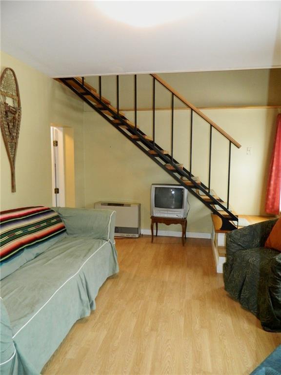49 Howe Hill Road Greenwood, ME 04255 - Photo 13 of 18 Stairway leads to the second floor...