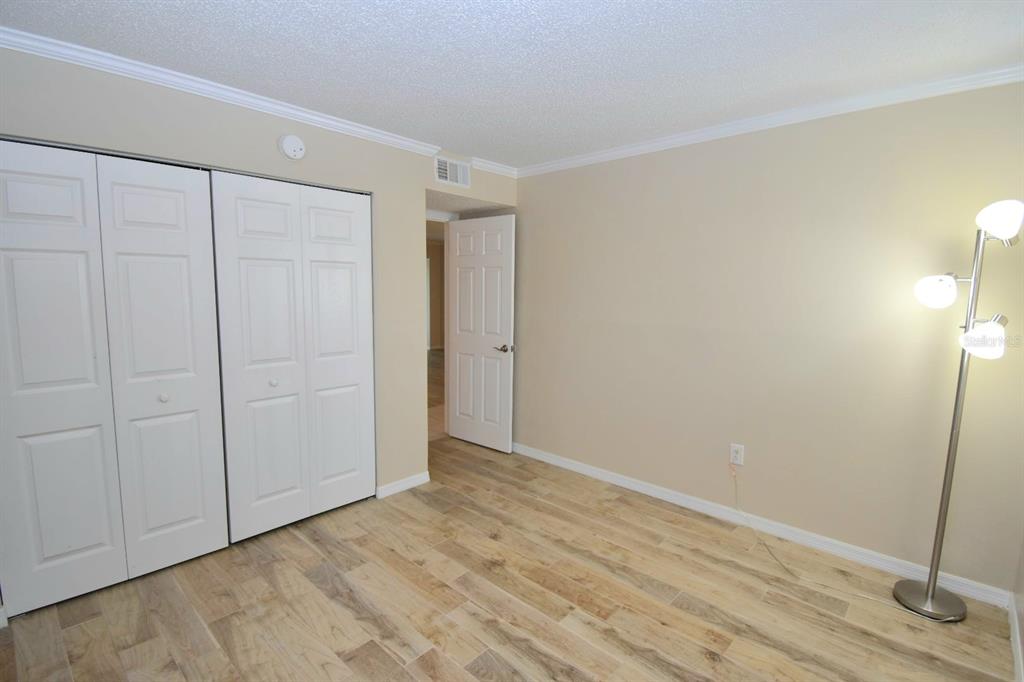 946 Virginia Street, Unit 102 Dunedin, FL 34698 - Photo 17 of 30 a view of an empty room