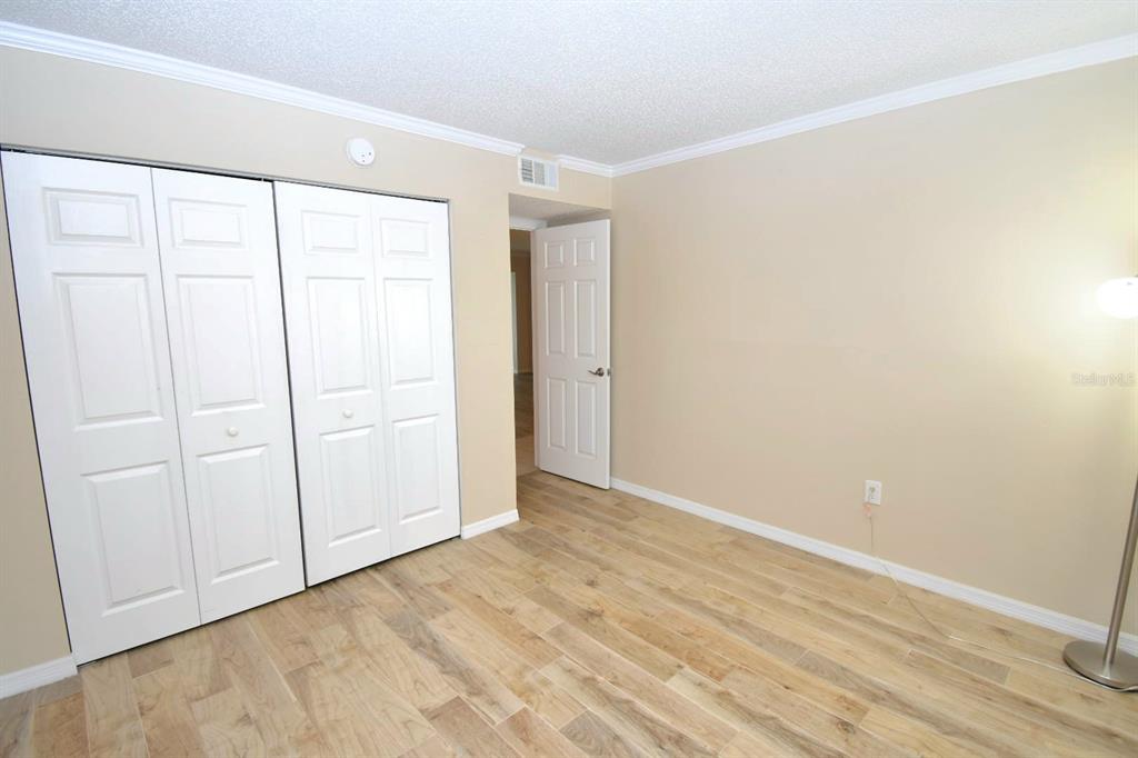 946 Virginia Street, Unit 102 Dunedin, FL 34698 - Photo 19 of 30 an empty room with windows