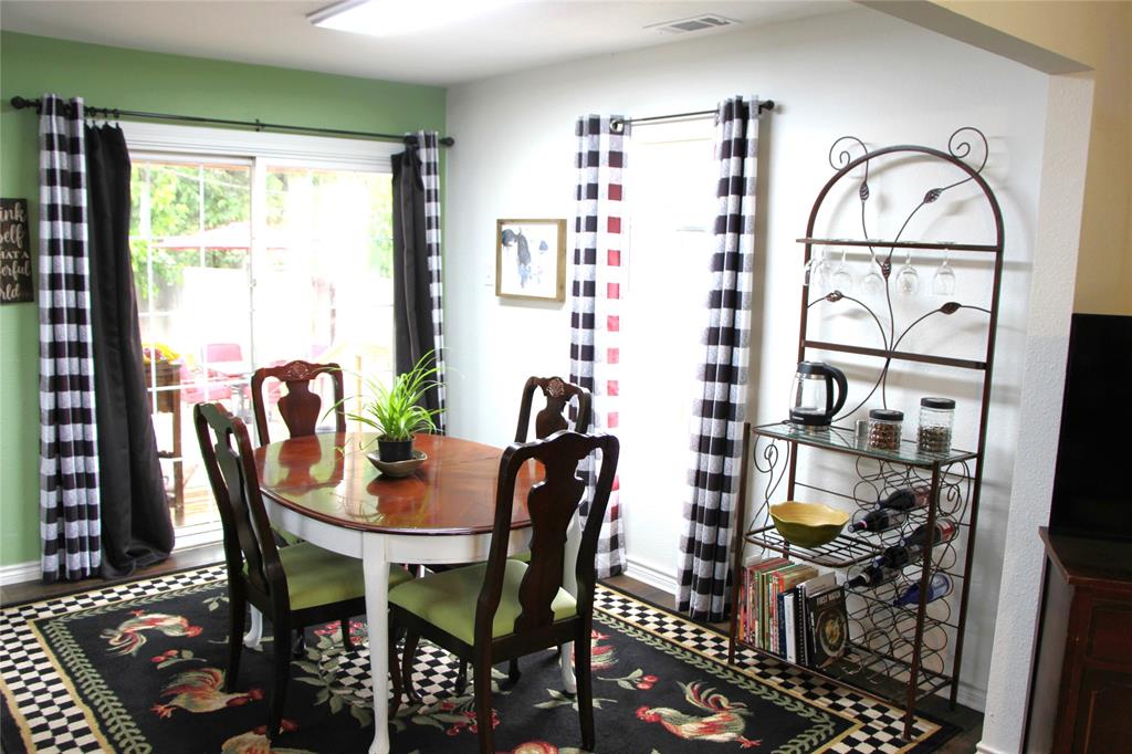 800 Griffin Road Albany, TX 76430 - Photo 5 of 15 a view of a dining room with furniture and window