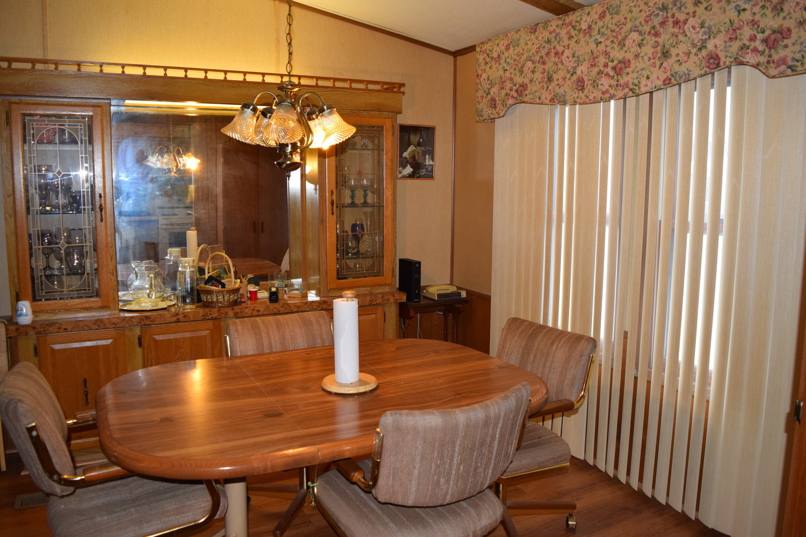 746 Chapparal Terrace Matteson, IL 60443 - Photo 7 of 17 a dining room with furniture and a chandelier