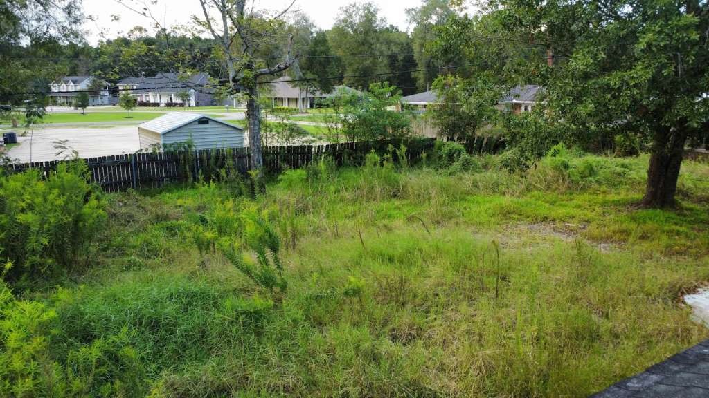 5403 Old State Highway Orange, TX 77632 - Photo 13 of 13 a view of a swimming pool and a yard