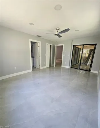 an empty room with windows