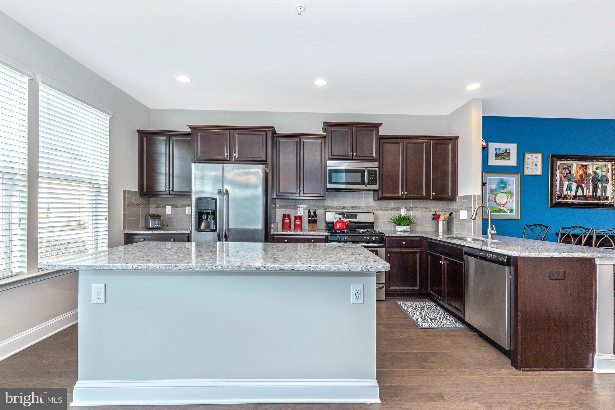 4656 Cambria Road Frederick, MD 21703 - Photo 7 of 46 large kitchen with island and ss appliances