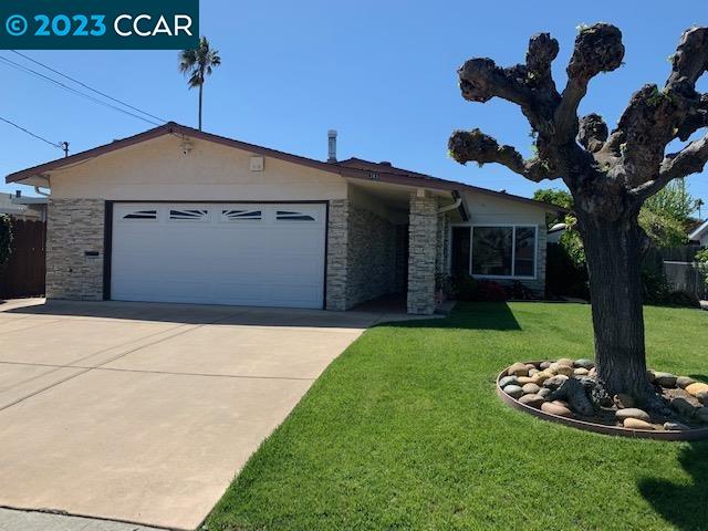 383 Levee Road Bay Point, CA 94565 - Photo 1 of 1 a front view of a house with a garden