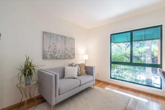 a room with a sink and cabinets
