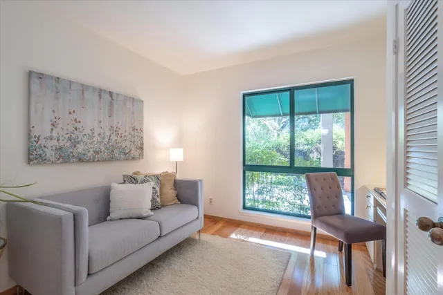 a kitchen with granite countertop a stove and a refrigerator