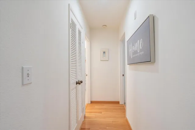 a bedroom with a bed and a table in it