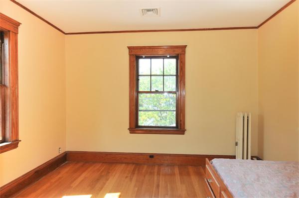 35 Overlook Road Arlington, MA 02474 - Photo 15 of 20 a view of a room with a wooden floor and a window