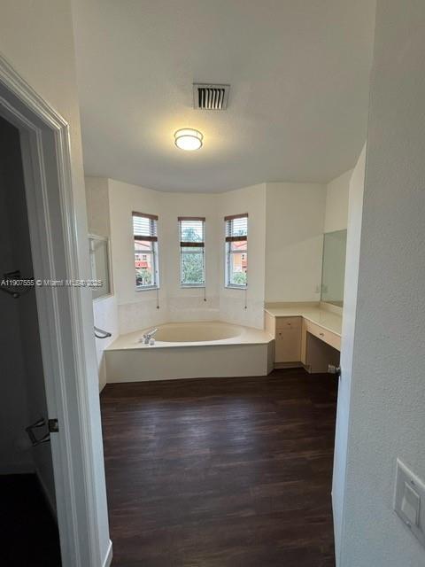 15530 Southwest 26th Terrace Miami, FL 33185 - Photo 12 of 26 a bathroom with a bathtub and a sink