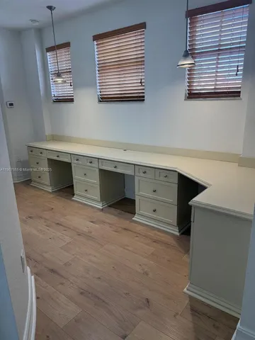 a room with furniture and a window