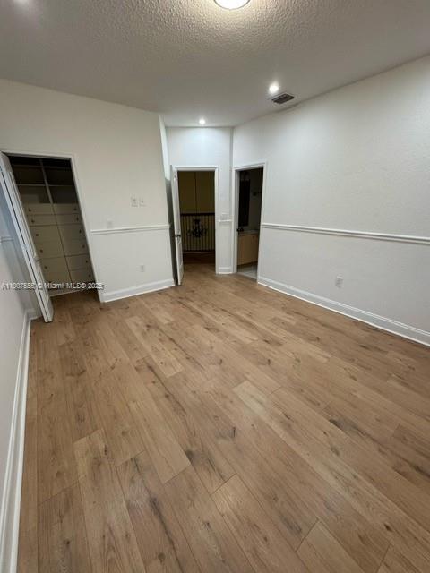 15530 Southwest 26th Terrace Miami, FL 33185 - Photo 18 of 26 a view of empty room with wooden floor