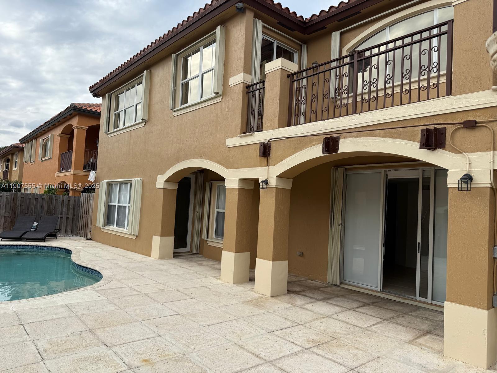15530 Southwest 26th Terrace Miami, FL 33185 - Photo 23 of 26 a view of a house with a yard