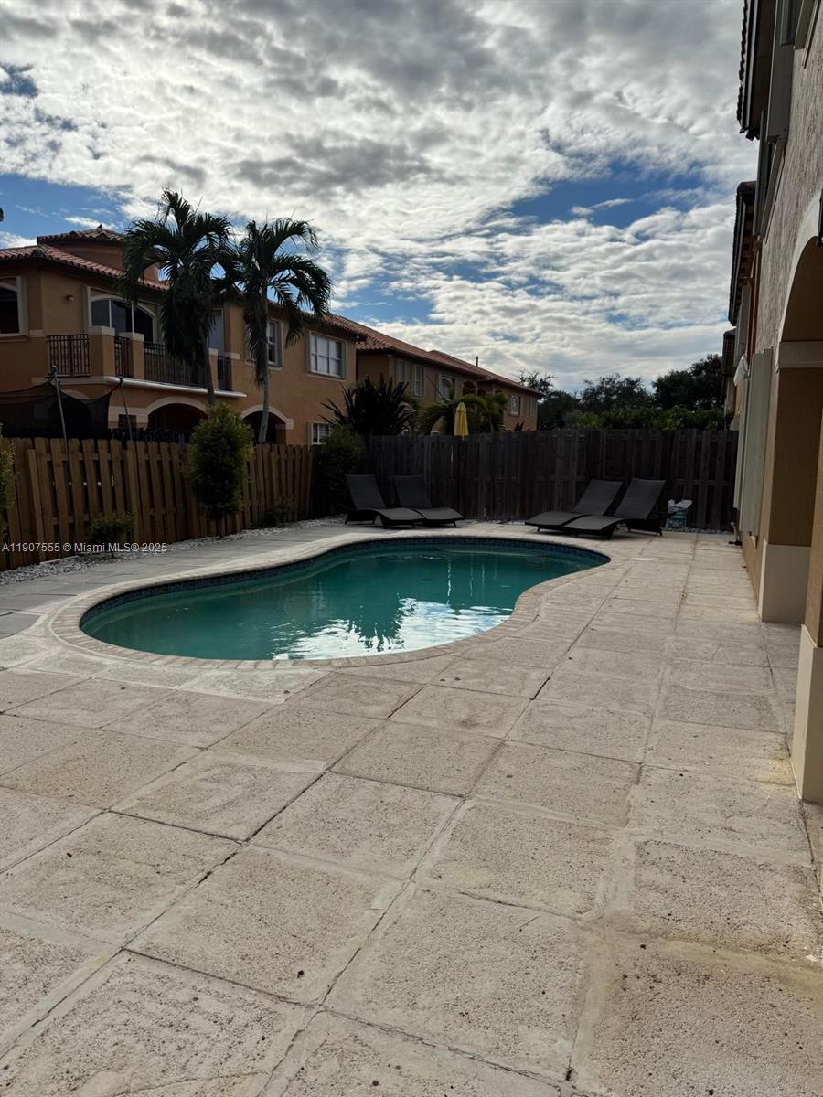 15530 Southwest 26th Terrace Miami, FL 33185 - Photo 26 of 26 a view of swimming pool outdoor seating