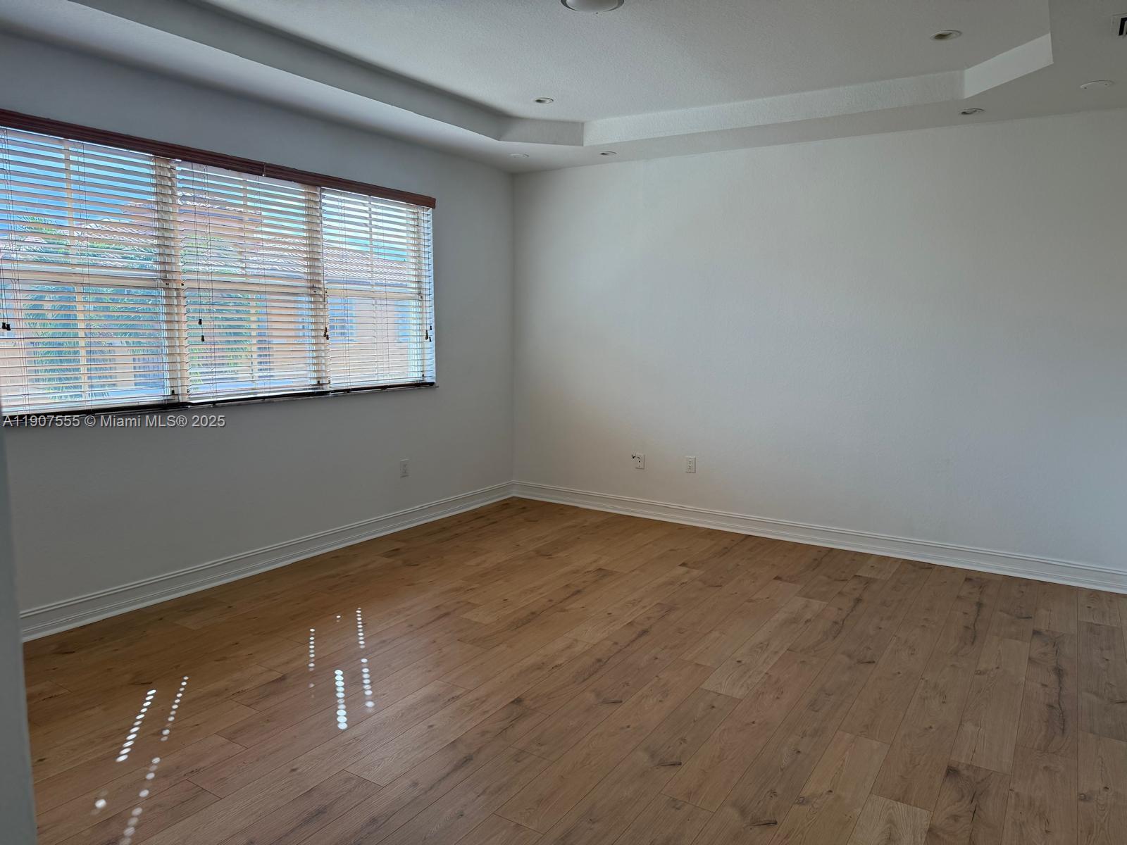 15530 Southwest 26th Terrace Miami, FL 33185 - Photo 9 of 26 a view of an empty room with a window