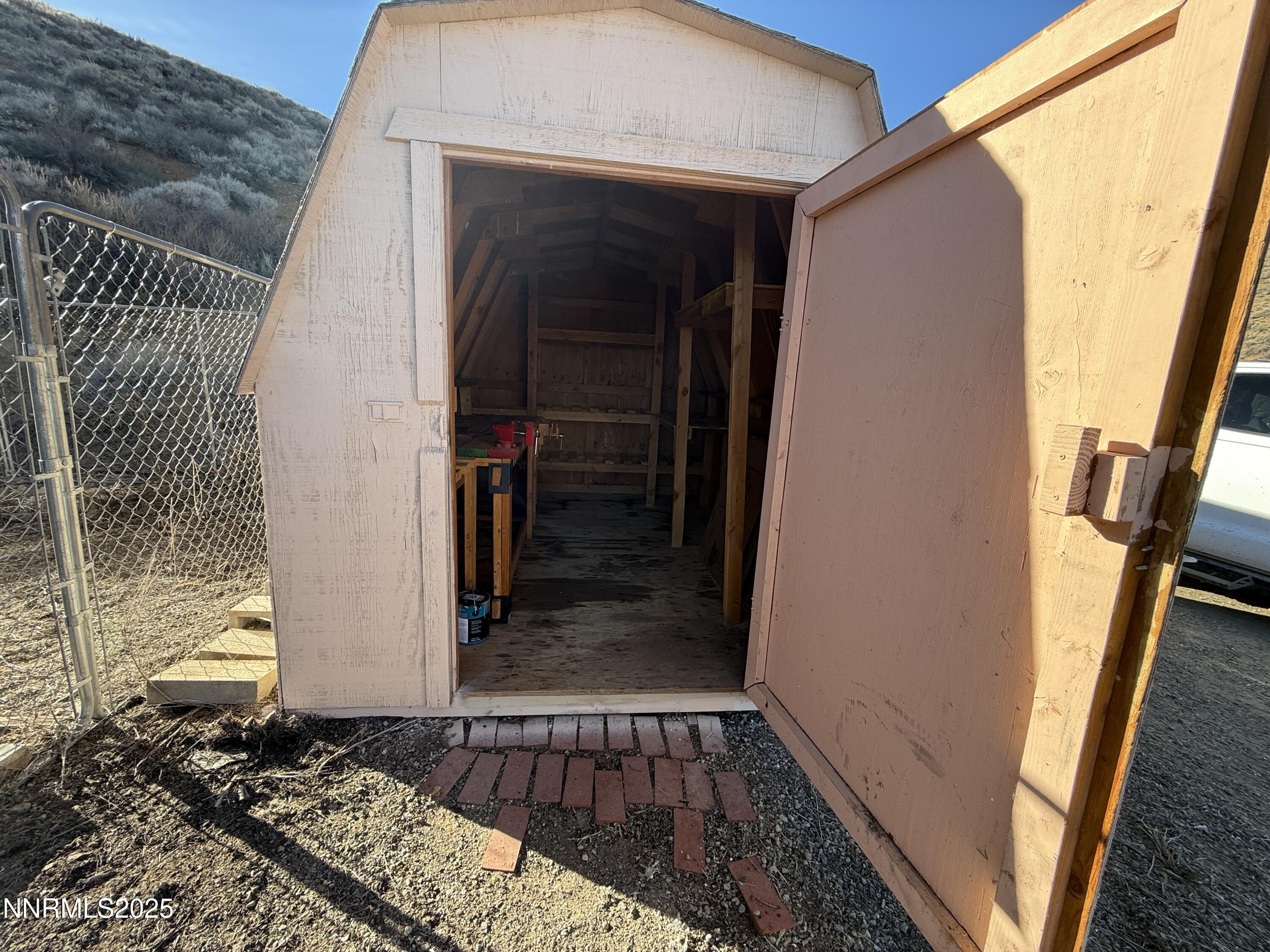 1166 Slate Road Topaz Ranch Estates, NV 89444 - Photo 23 of 31 a view of a door and wooden floor
