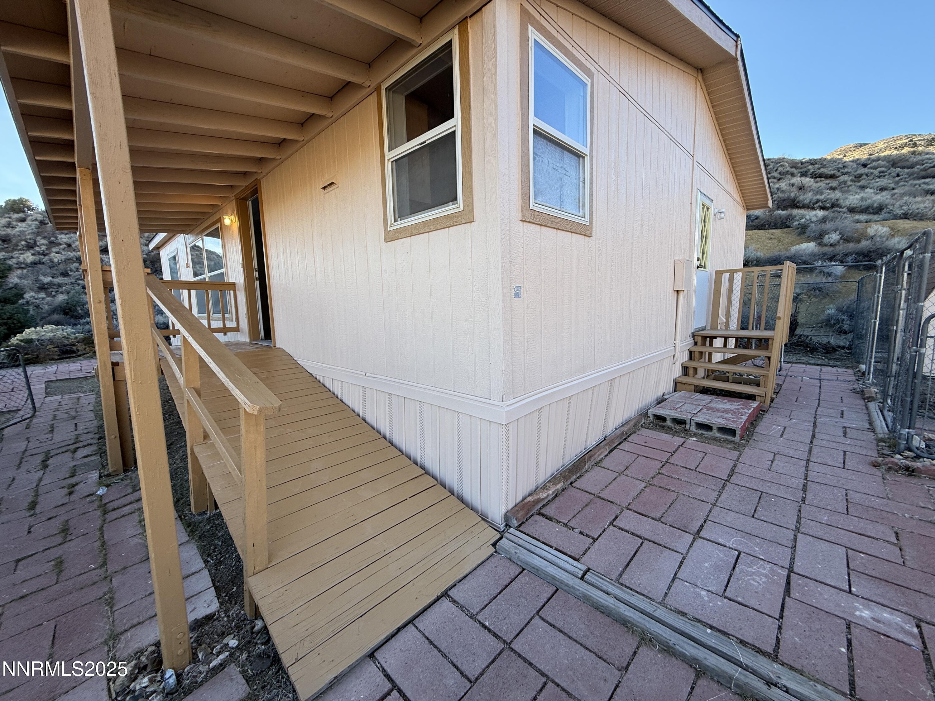 1166 Slate Road Topaz Ranch Estates, NV 89444 - Photo 3 of 31 a view of a backyard with sitting area