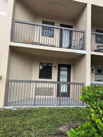 a view of a house that has a deck