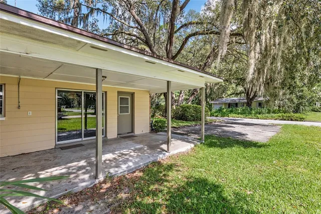a view of a porch with a backyard