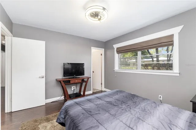 a bathroom with a sink toilet and mirror