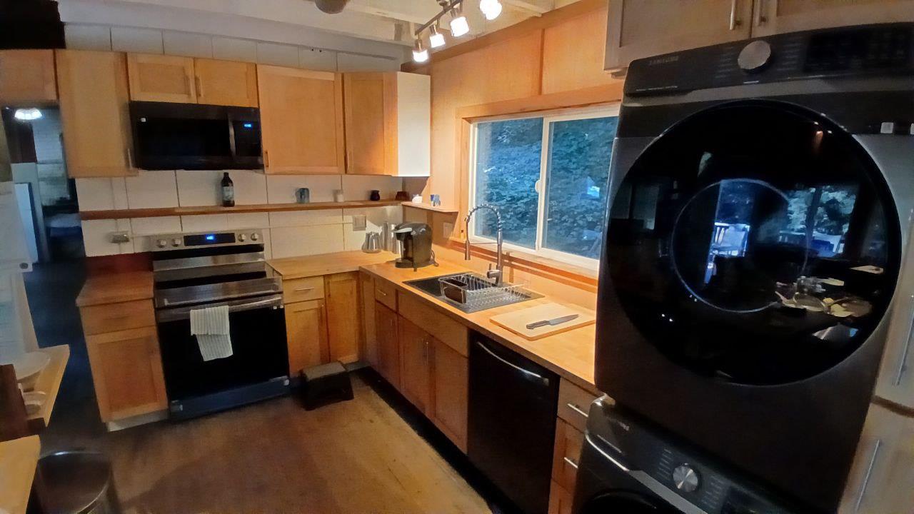 191 High Street Brookdale, CA 95007 - Photo 3 of 3 a kitchen with a stove a sink and a microwave