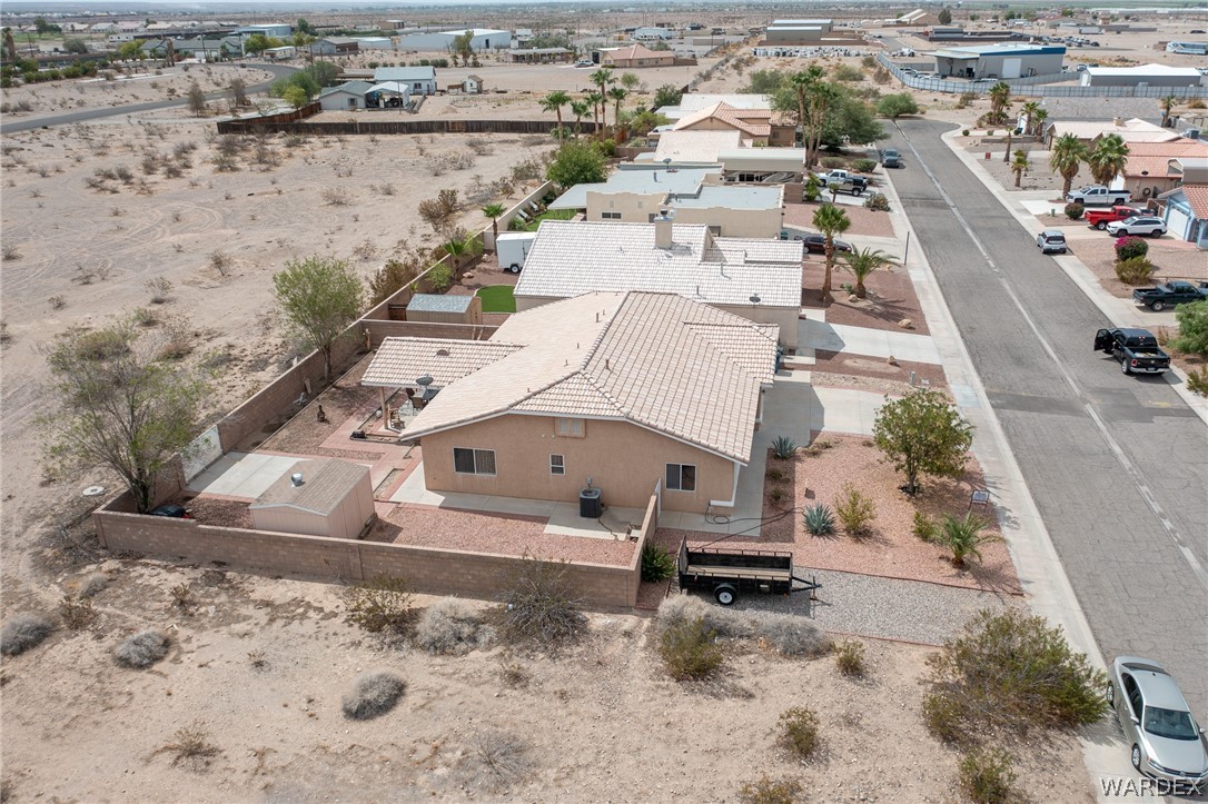5762 Ruth Drive Fort Mohave, AZ 86426 - Photo 27 of 29 an aerial view of a house with a yard and mountain view
