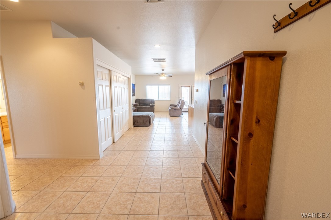 5762 Ruth Drive Fort Mohave, AZ 86426 - Photo 3 of 29 a view of a refrigerator in kitchen and a window