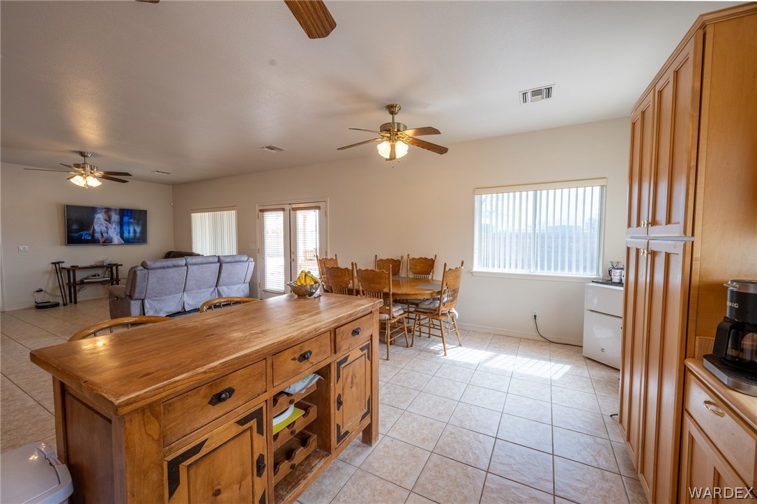 5762 Ruth Drive Fort Mohave, AZ 86426 - Photo 5 of 29 a living room with furniture a flat screen tv and a window