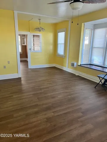 a view of an entryway with a chandelier