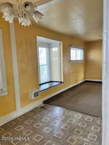 a kitchen with sink cabinets and window