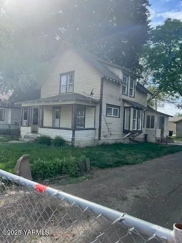 a view of a big yard next to a yard