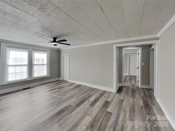 a view of an empty room and window