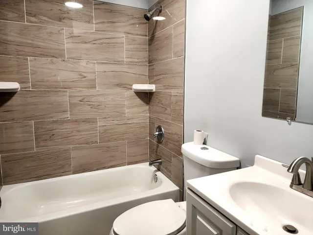 a bathroom with a sink and bathtub