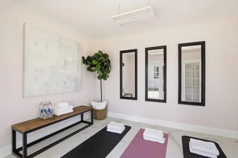 a view of a swimming pool with a lounge chairs