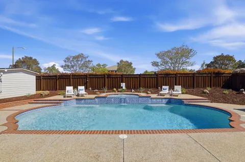 a house view with a outdoor space