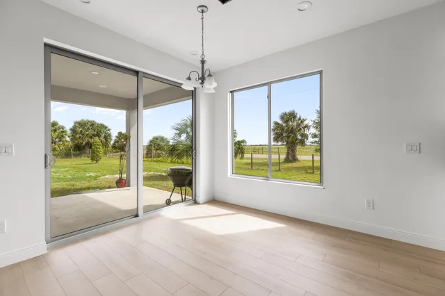a view of an empty room and window