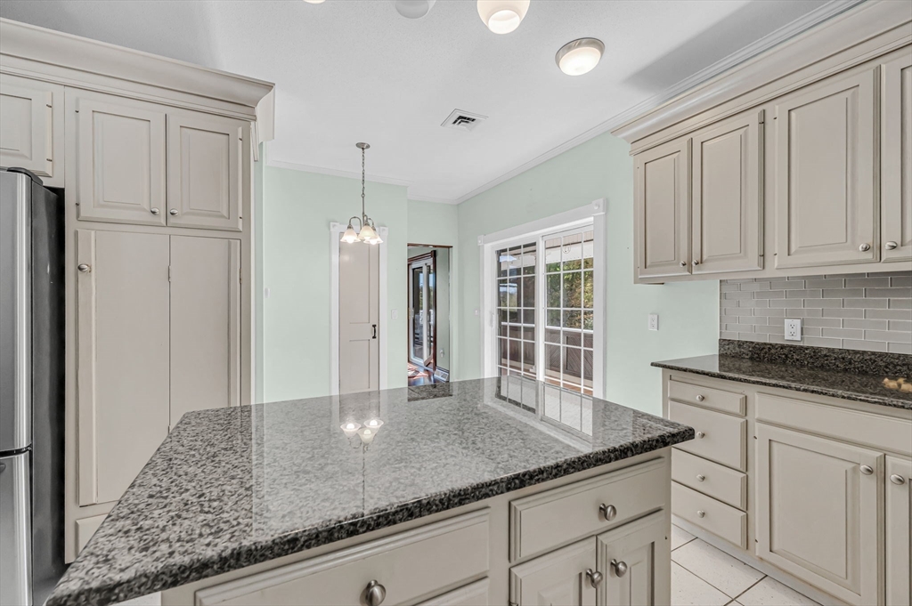 199 Chapin Road Hampden, MA 01036 - Photo 22 of 42 a kitchen with stainless steel appliances granite countertop a sink and cabinets with granite countertops